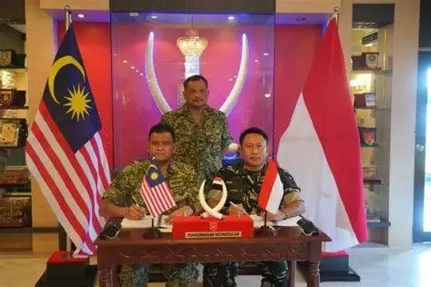 Pengamanan Perbatasan RI-Malaysia Kerjasama Perbatasan Indonesia Malaysia